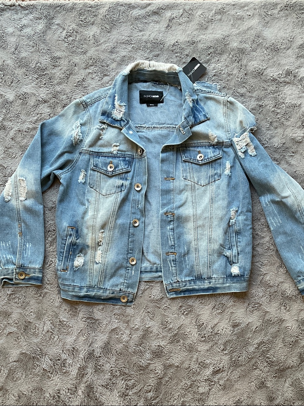Distressed Light Blue Denim Trucker Jacket